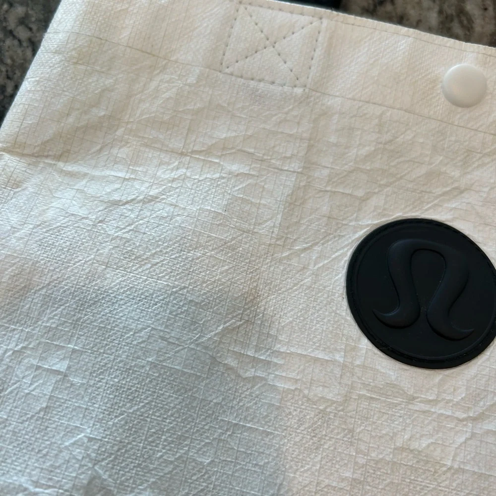 lululemon athletica Black and Cream Tote has wear stains piling